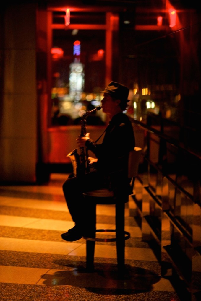 This sax player was a very welcome surprise adding to the capturing view of Manhattan's city lights. ©Hans Nagl - All Rights Reserved
